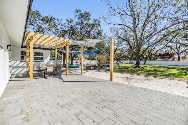 5744 150th Ave N, Clearwater, FL 33760 - view of patio with a pergola and outdoor dining space