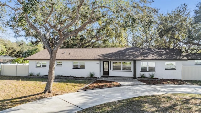 5744 150th Ave N, Clearwater, FL 33760 - single story home featuring brick siding and roof with shingles