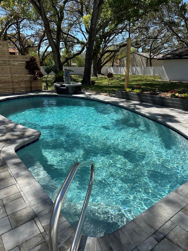 5744 150th Ave N, Clearwater, FL 33760 - view of swimming pool featuring a fenced backyard