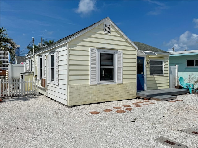 13326 1st St E, Madeira Beach, FL 33708 - view of front of property with fence