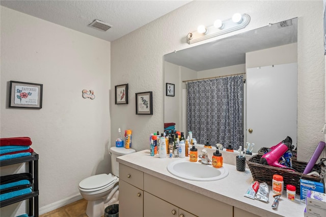 1250/1252/1254 Sylvia Ave, Spring Hill, FL 34606 - full bath with toilet, a textured wall, vanity, tile patterned floors, and curtained shower