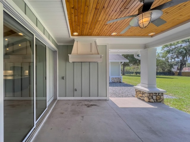 view of patio featuring ceiling fan