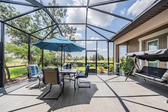32242 Summerglade Dr, Wesley Chapel, FL 33545 - view of patio / terrace featuring a lanai and outdoor dining space