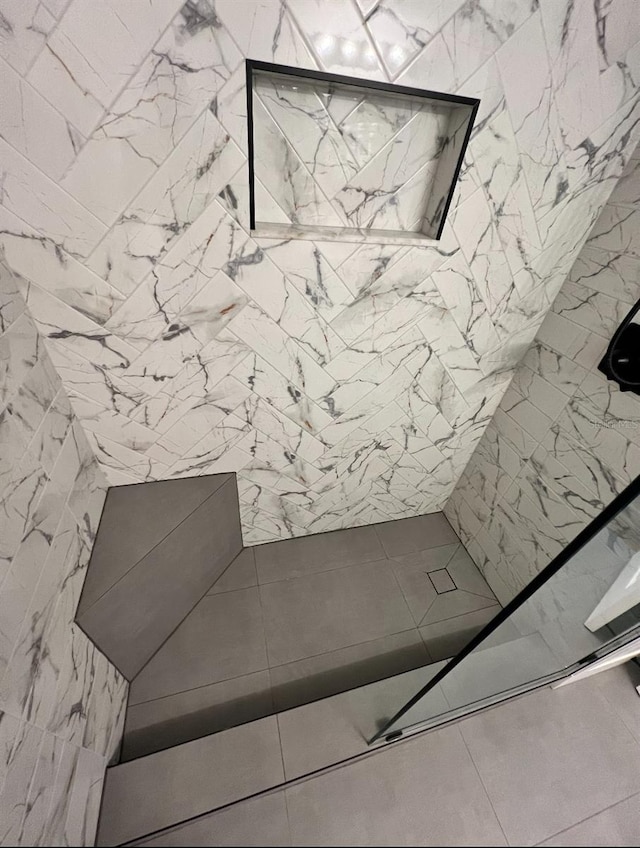 2424 W Tampa Bay Blvd Unit 203, Tampa, FL 33607 - bathroom with tiled shower