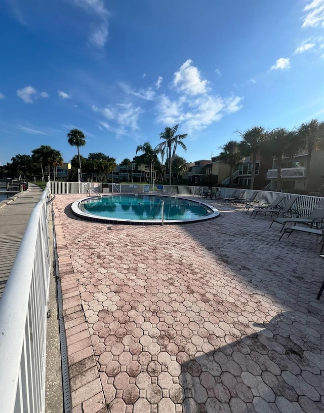 2424 W Tampa Bay Blvd Unit 203, Tampa, FL 33607 - community pool with fence and a patio