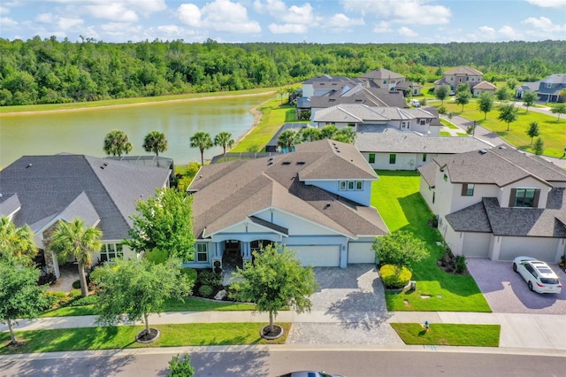 4093 Epic Cv, Land O Lakes, FL 34638 - aerial view of residential area featuring a forest and a nearby body of water