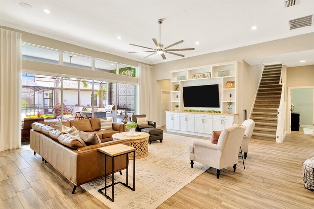 4093 Epic Cv, Land O Lakes, FL 34638 - living room with ceiling fan, light wood finished floors, stairs, and recessed lighting