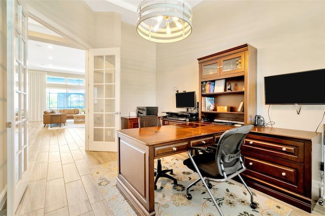 4093 Epic Cv, Land O Lakes, FL 34638 - office featuring french doors, a towering ceiling, and a chandelier