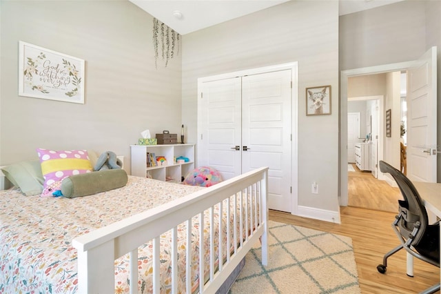 4093 Epic Cv, Land O Lakes, FL 34638 - bedroom featuring light wood-type flooring, a closet, and baseboards