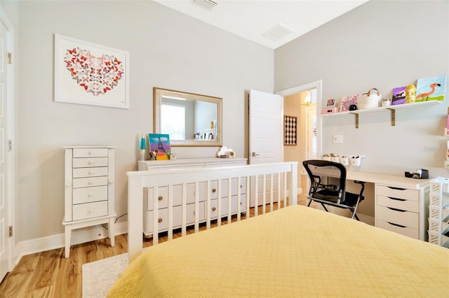 4093 Epic Cv, Land O Lakes, FL 34638 - bedroom featuring light wood-style floors, baseboards, and a desk