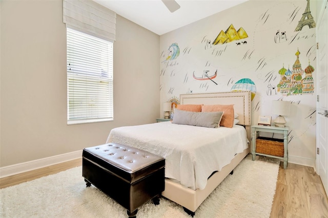4093 Epic Cv, Land O Lakes, FL 34638 - bedroom featuring light wood finished floors, baseboards, and multiple windows