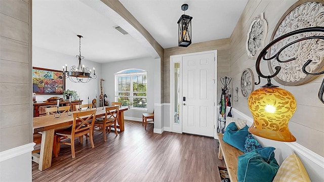 5040 Inshore Landing Dr, Apollo Beach, FL 33572 - entrance foyer with wood finished floors, a chandelier, and baseboards