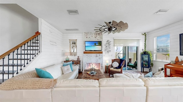 5040 Inshore Landing Dr, Apollo Beach, FL 33572 - living room featuring stairs and a ceiling fan