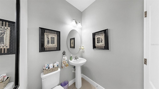 5040 Inshore Landing Dr, Apollo Beach, FL 33572 - bathroom with toilet, baseboards, and tile patterned floors