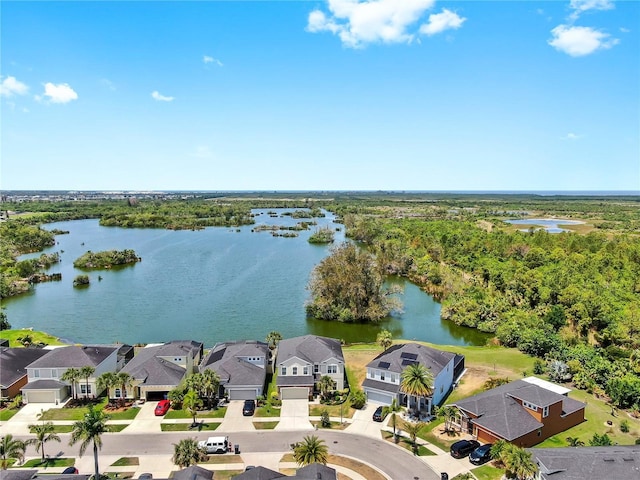 5040 Inshore Landing Dr, Apollo Beach, FL 33572 - aerial perspective of suburban area with a large body of water