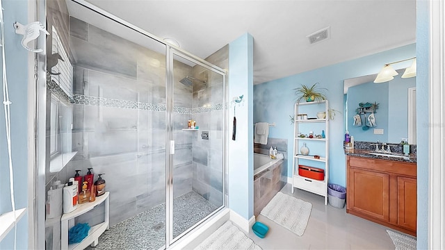 5040 Inshore Landing Dr, Apollo Beach, FL 33572 - bathroom featuring a shower stall, vanity, and a bath