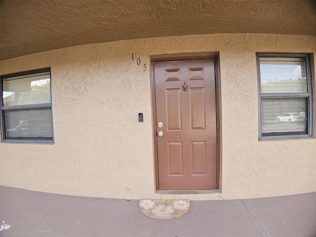 10003 Winding Lake Rd Unit 105, Sunrise, FL 33351 - doorway to property with stucco siding
