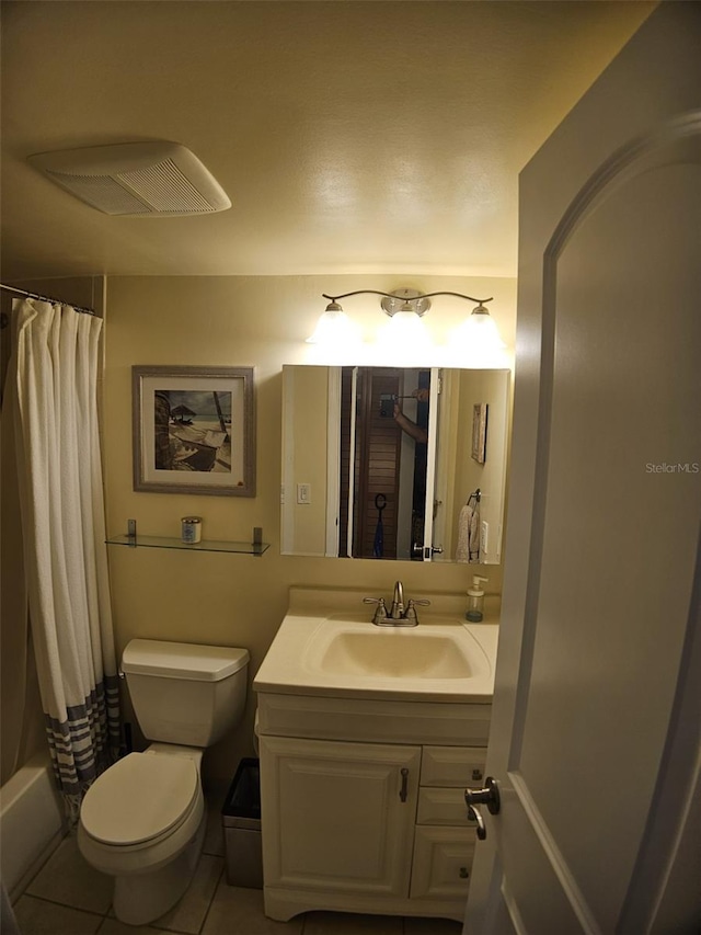 10003 Winding Lake Rd Unit 105, Sunrise, FL 33351 - bathroom featuring vanity, toilet, and tile patterned floors