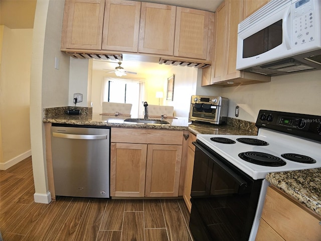10003 Winding Lake Rd Unit 105, Sunrise, FL 33351 - kitchen with stainless steel dishwasher, electric range, white microwave, a sink, and dark wood-style flooring