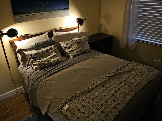 10003 Winding Lake Rd Unit 105, Sunrise, FL 33351 - bedroom featuring wood finished floors and baseboards