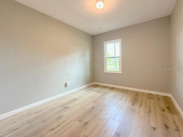 1536 S Martin Luther King Jr Ave, Clearwater, FL 33756 - unfurnished room featuring light wood finished floors and baseboards