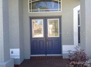 4512 River Overlook Dr, Valrico, FL 33596 - doorway to property featuring french doors and stucco siding