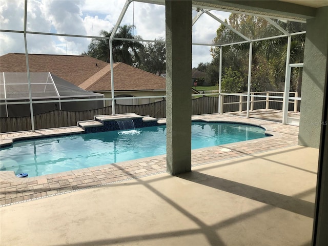 4512 River Overlook Dr, Valrico, FL 33596 - view of pool featuring a fenced backyard, a patio area, and glass enclosure