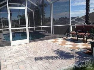 4512 River Overlook Dr, Valrico, FL 33596 - view of patio / terrace featuring an outdoor pool and glass enclosure