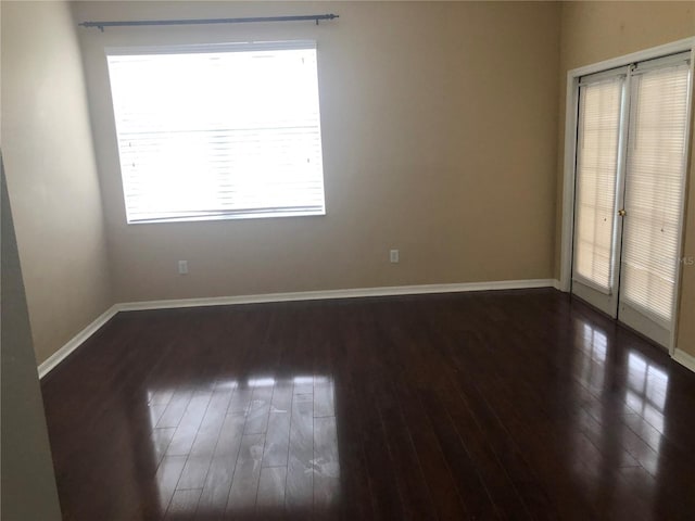 4512 River Overlook Dr, Valrico, FL 33596 - unfurnished room featuring wood finished floors and baseboards