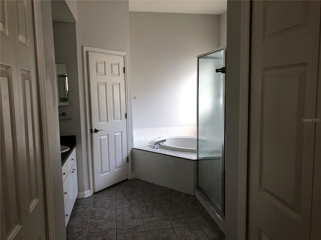 4512 River Overlook Dr, Valrico, FL 33596 - full bath with a garden tub, a shower stall, and vanity