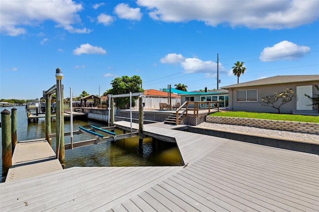 3912 Doral Dr, Tampa, FL 33634 - dock area with boat lift and a water view