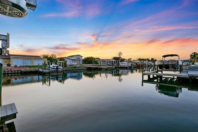 3912 Doral Dr, Tampa, FL 33634 - dock area with boat lift and a water view