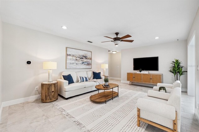 3912 Doral Dr, Tampa, FL 33634 - living room featuring ceiling fan and recessed lighting