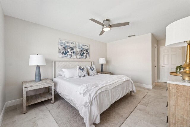 3912 Doral Dr, Tampa, FL 33634 - bedroom featuring baseboards and a ceiling fan