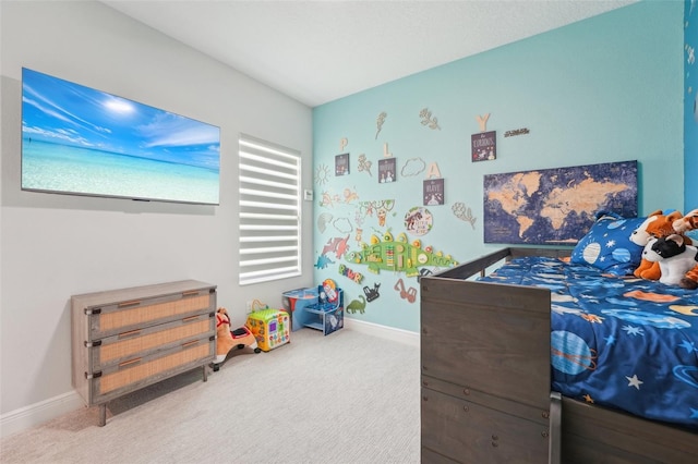 carpeted bedroom with baseboards and multiple windows