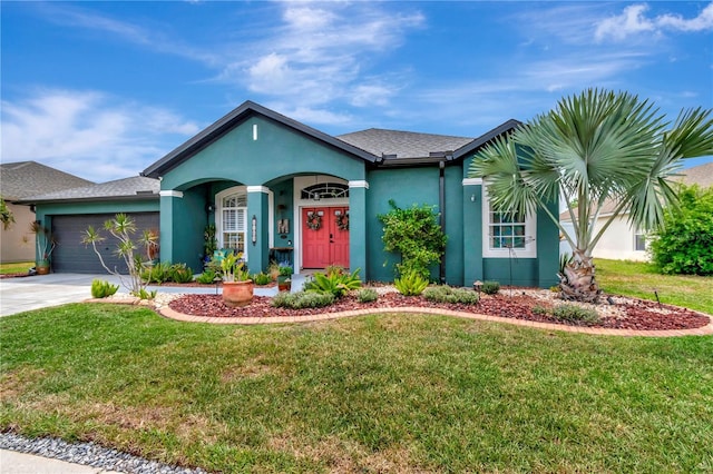 5103 Rushbrook Rd, Land O Lakes, FL 34638 - ranch-style home featuring stucco siding, a front yard, concrete driveway, and an attached garage