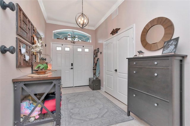 5103 Rushbrook Rd, Land O Lakes, FL 34638 - entrance foyer featuring a chandelier, ornamental molding, light tile patterned flooring, and baseboards