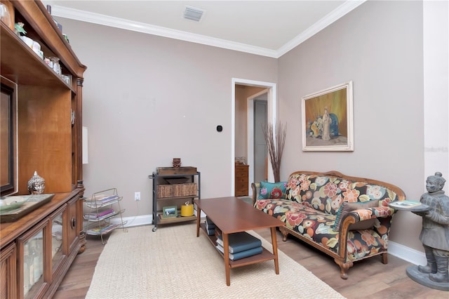 5103 Rushbrook Rd, Land O Lakes, FL 34638 - living room with baseboards, crown molding, and light wood finished floors