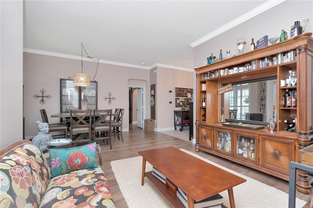 5103 Rushbrook Rd, Land O Lakes, FL 34638 - living room featuring light wood-style floors, ornamental molding, and baseboards