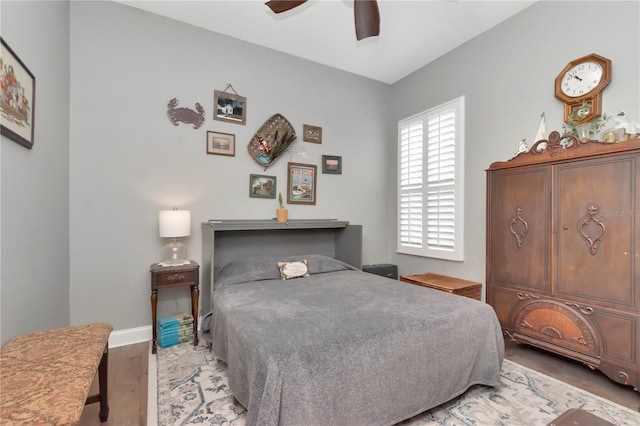 5103 Rushbrook Rd, Land O Lakes, FL 34638 - bedroom featuring wood finished floors, baseboards, and ceiling fan