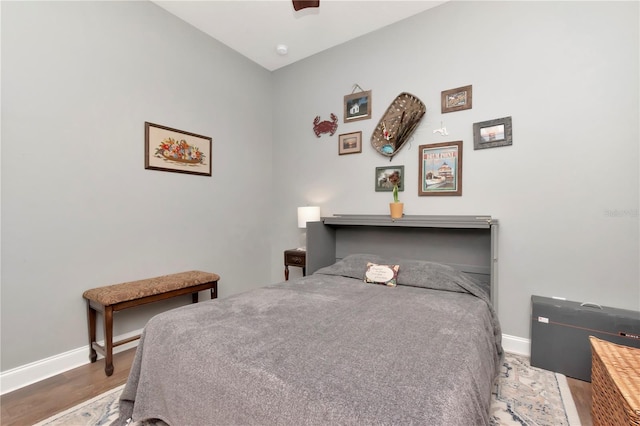 5103 Rushbrook Rd, Land O Lakes, FL 34638 - bedroom featuring baseboards, wood finished floors, and a ceiling fan