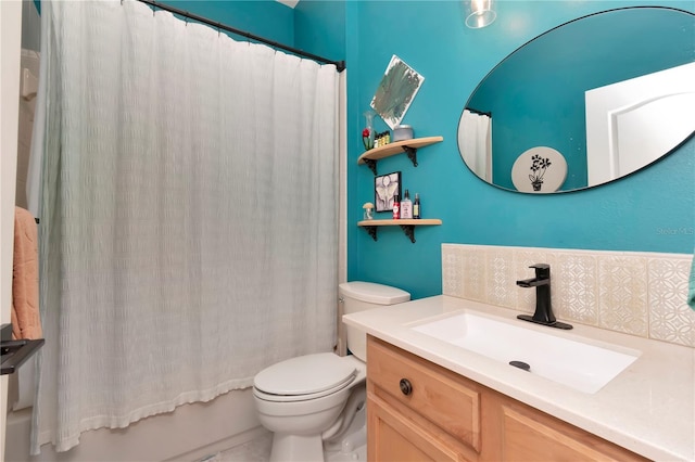 5103 Rushbrook Rd, Land O Lakes, FL 34638 - full bathroom with toilet, vanity, shower / tub combo with curtain, and backsplash