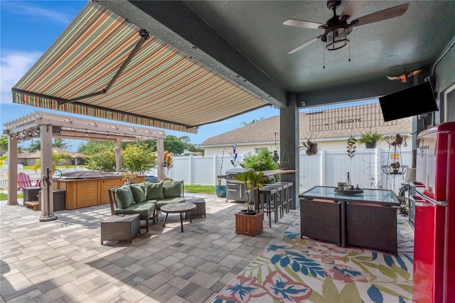 5103 Rushbrook Rd, Land O Lakes, FL 34638 - view of patio / terrace with a hot tub, a fenced backyard, a ceiling fan, and an outdoor hangout area