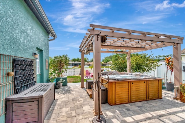 5103 Rushbrook Rd, Land O Lakes, FL 34638 - view of patio / terrace with a hot tub, a fenced backyard, and a pergola