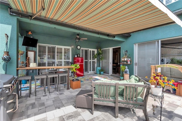 5103 Rushbrook Rd, Land O Lakes, FL 34638 - view of patio featuring a ceiling fan, outdoor dining space, and an outdoor hangout area