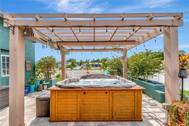 5103 Rushbrook Rd, Land O Lakes, FL 34638 - view of patio featuring a hot tub, a pergola, and a fenced backyard