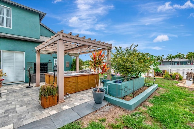 5103 Rushbrook Rd, Land O Lakes, FL 34638 - view of patio featuring a hot tub, a garden, and a pergola