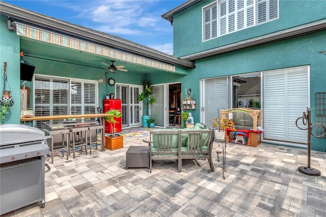 5103 Rushbrook Rd, Land O Lakes, FL 34638 - view of patio featuring a ceiling fan, a grill, and an outdoor hangout area