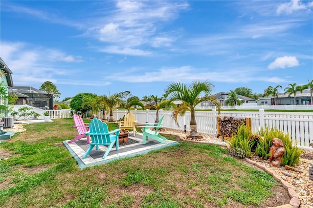 5103 Rushbrook Rd, Land O Lakes, FL 34638 - view of yard with a fire pit, cooling unit, a patio, and a residential view