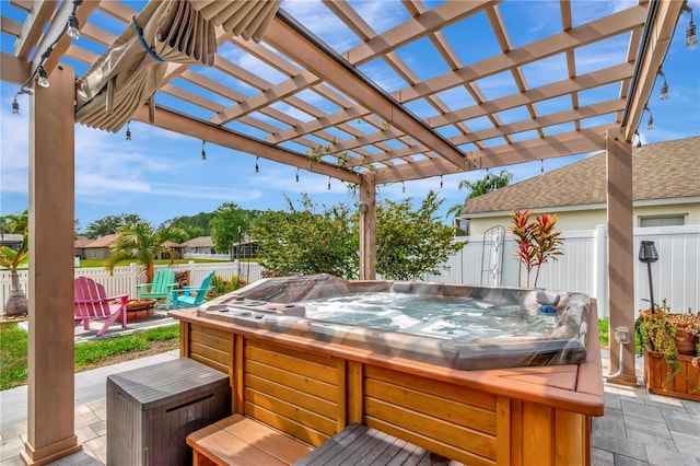 5103 Rushbrook Rd, Land O Lakes, FL 34638 - wooden terrace featuring an outdoor fire pit, a hot tub, a fenced backyard, and a patio
